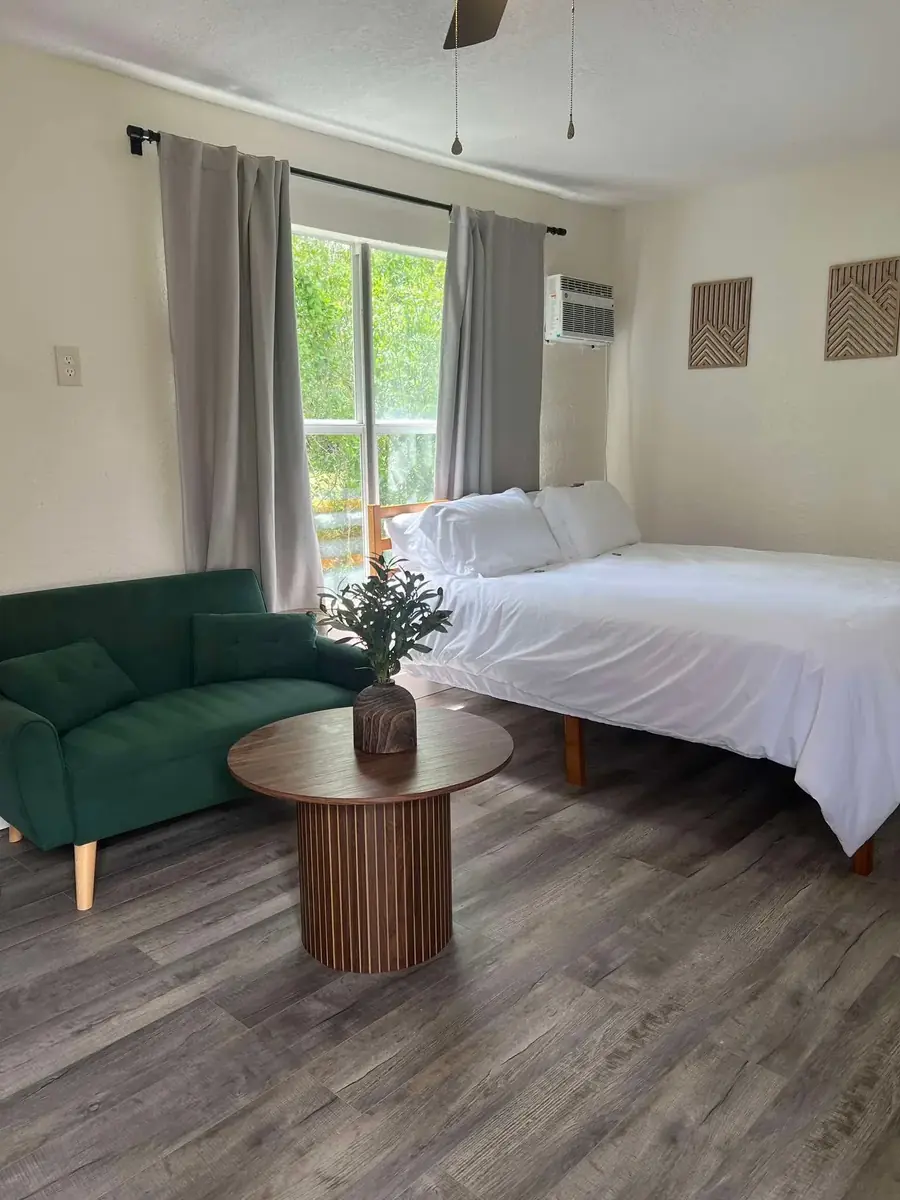 Deep cleaned studio apartment sitting area, fresh and spotless