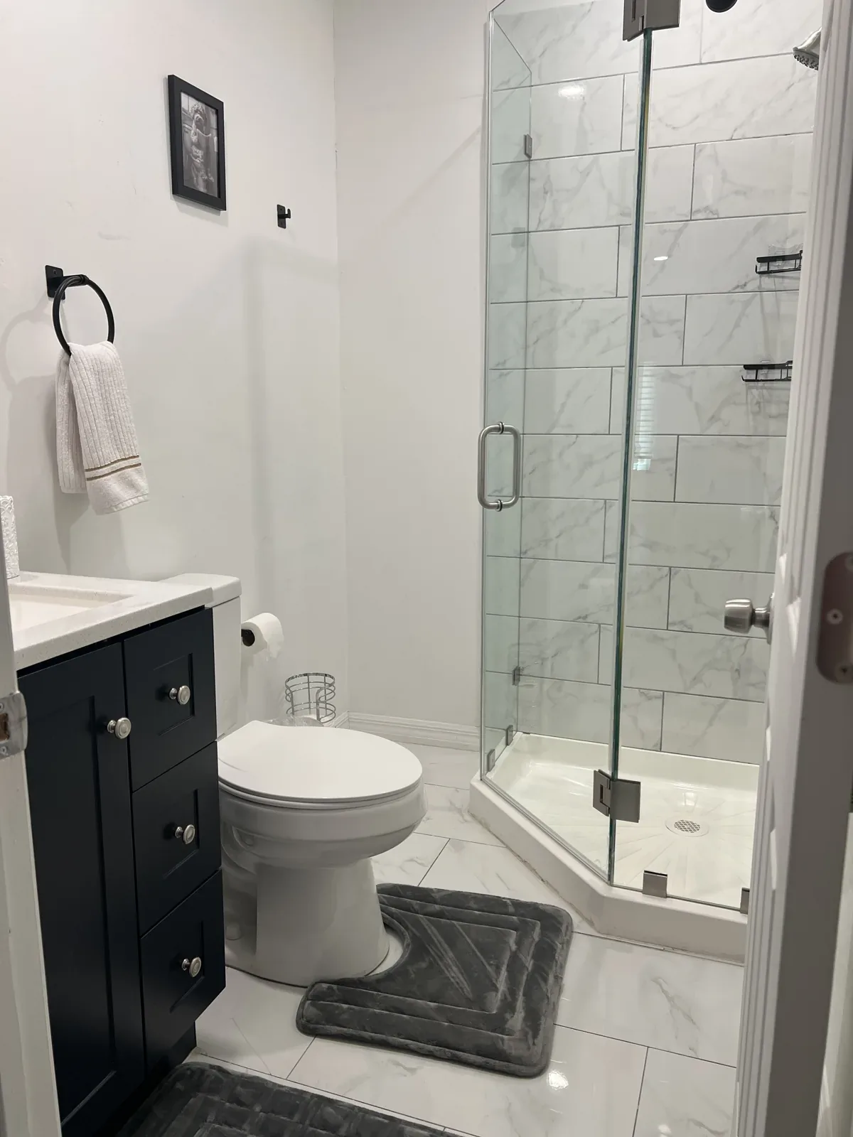 Glass shower and bathroom after cleaning