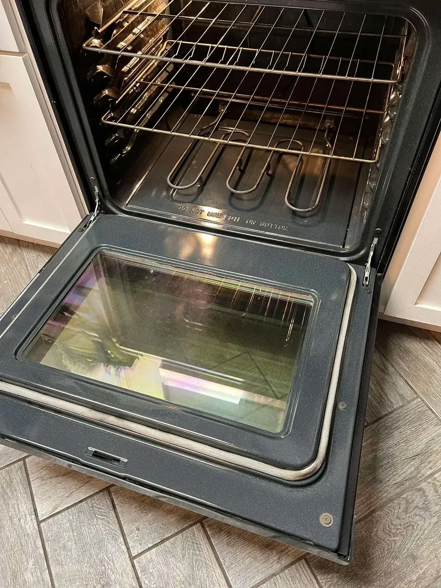 Oven interior cleaned thoroughly for move-out inspection